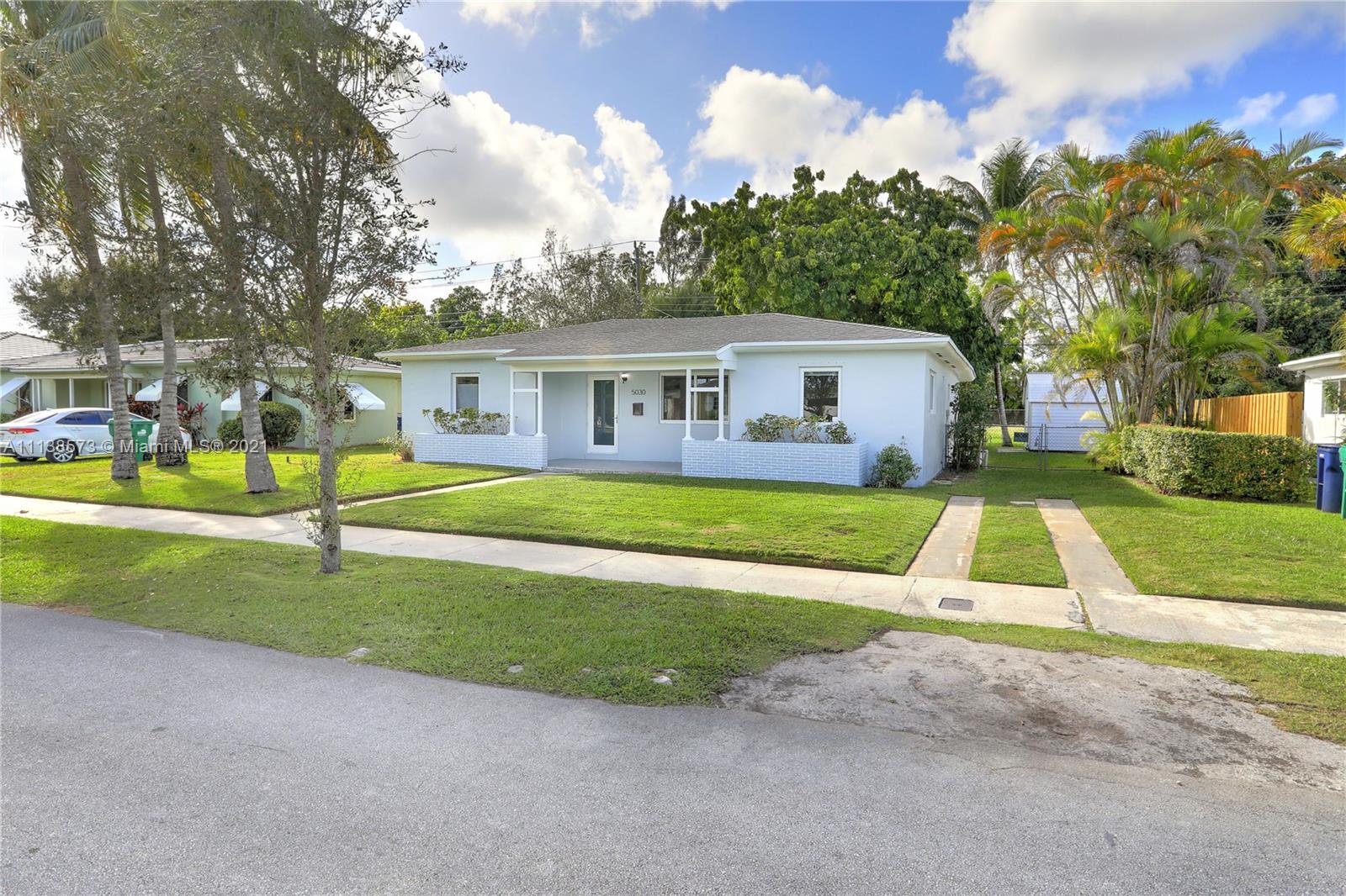 Glenvar Heights Miami, FL 33155 - Photo 3 of 22 a view of house with a yard
