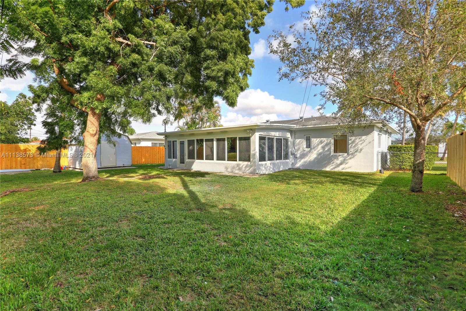 Glenvar Heights Miami, FL 33155 - Photo 6 of 22 a house with swimming pool in front of it