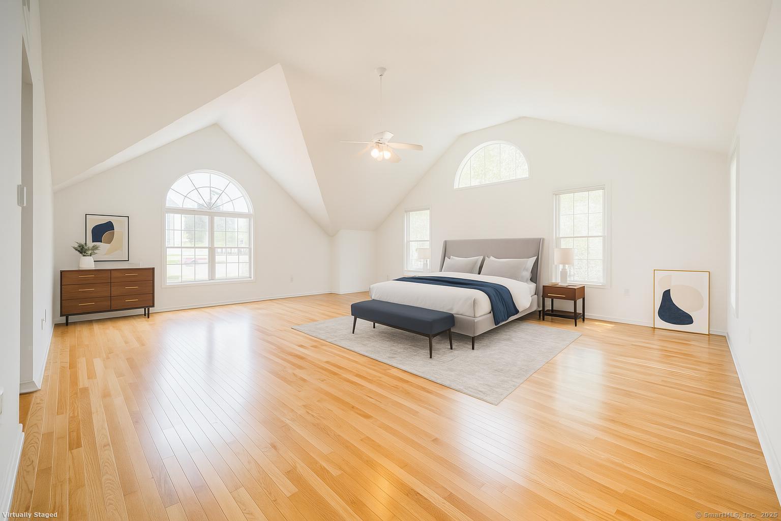 52 Quarry Lane Hamden, CT 06518 - Photo 16 of 29 a spacious bedroom with a bed a dresser and wooden floor