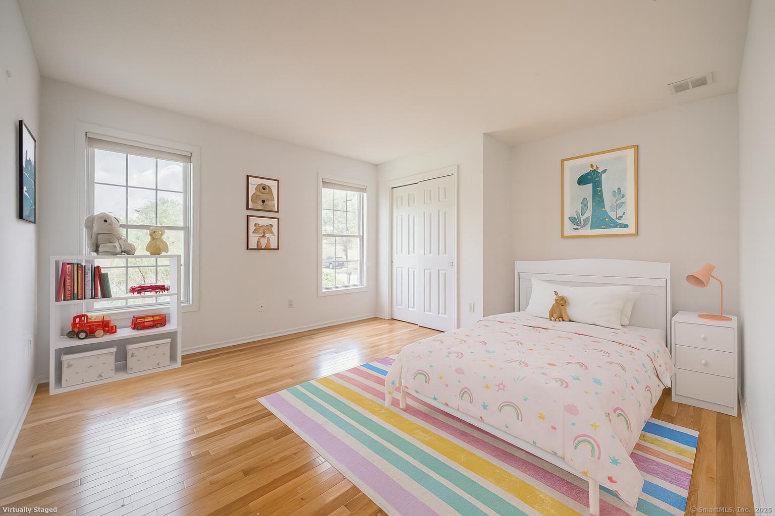 52 Quarry Lane Hamden, CT 06518 - Photo 19 of 29 a bedroom with a bed and a window