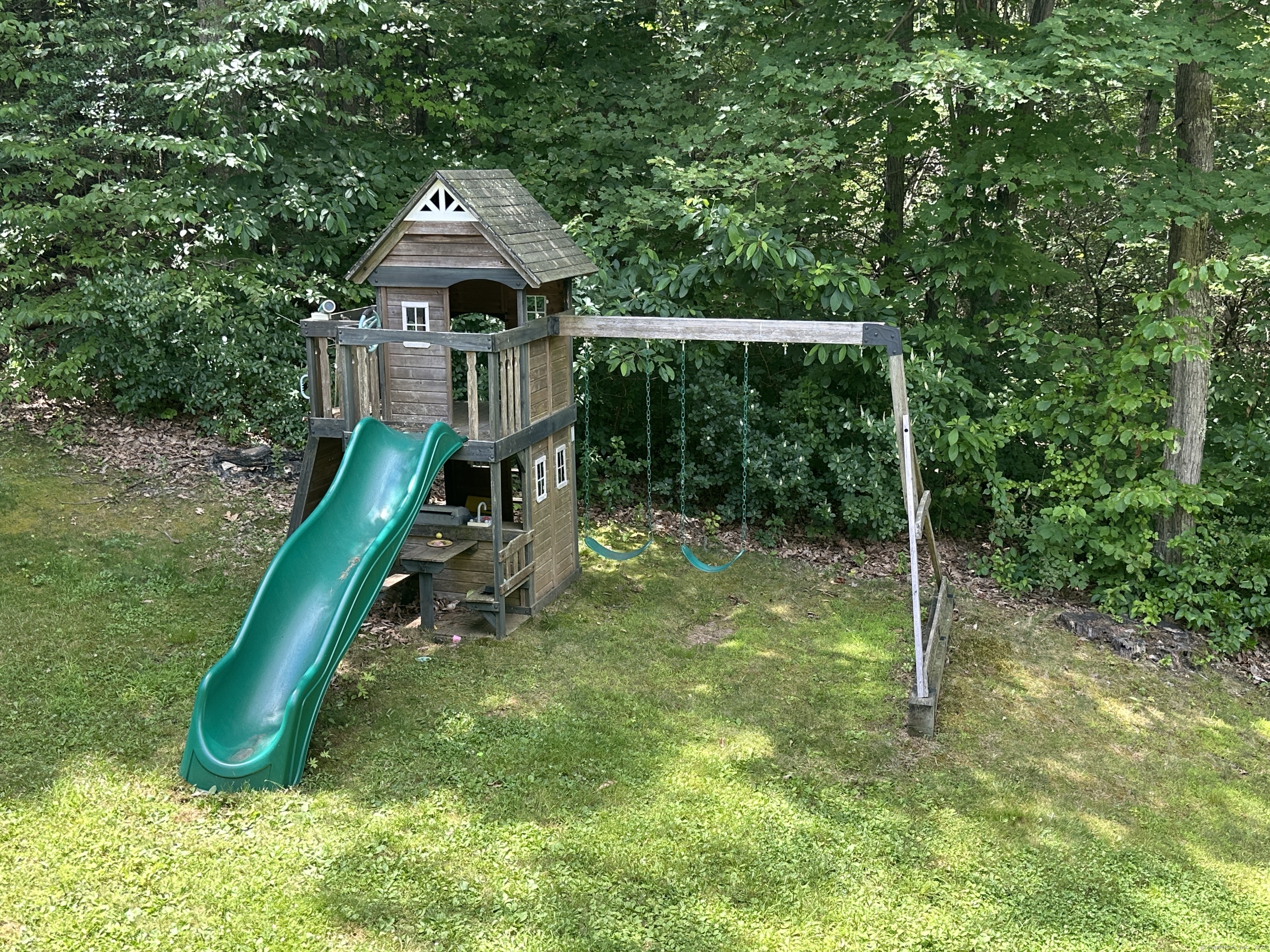52 Quarry Lane Hamden, CT 06518 - Photo 26 of 29 a front view of a house with a yard