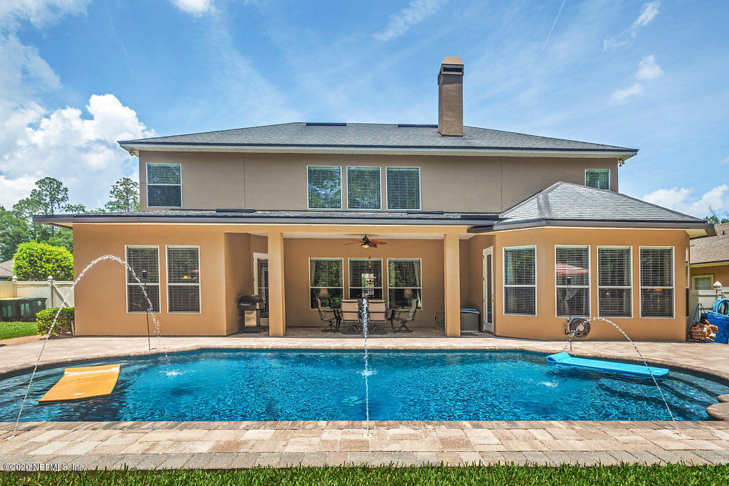 3824 Reds Gait Lane Jacksonville, FL 32223 - Photo 2 of 68 a front view of a house with swimming pool