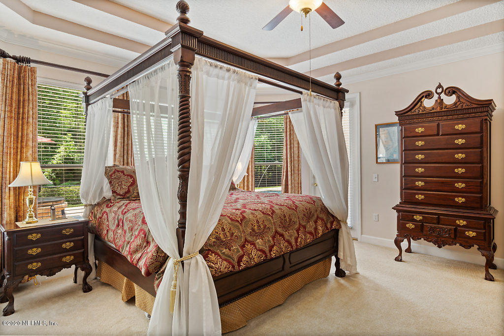 3824 Reds Gait Lane Jacksonville, FL 32223 - Photo 25 of 68 a bedroom with two bunk beds and a window
