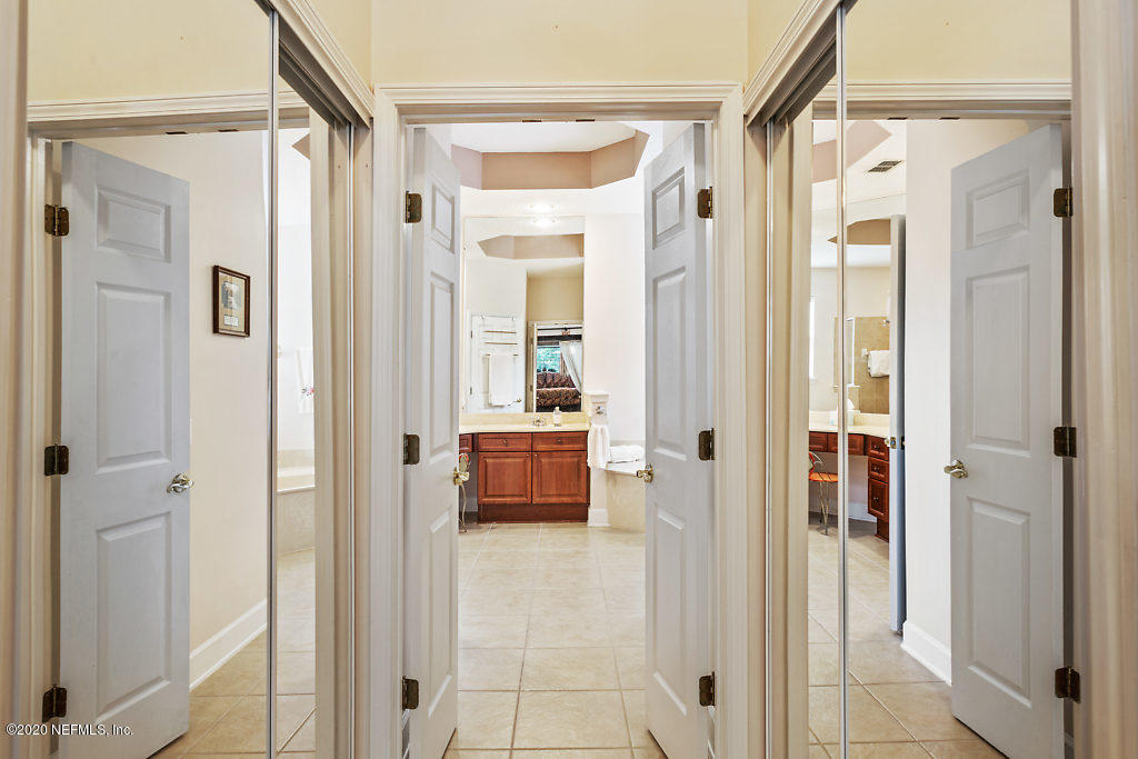 3824 Reds Gait Lane Jacksonville, FL 32223 - Photo 26 of 68 a bathroom with a shower and a glass door