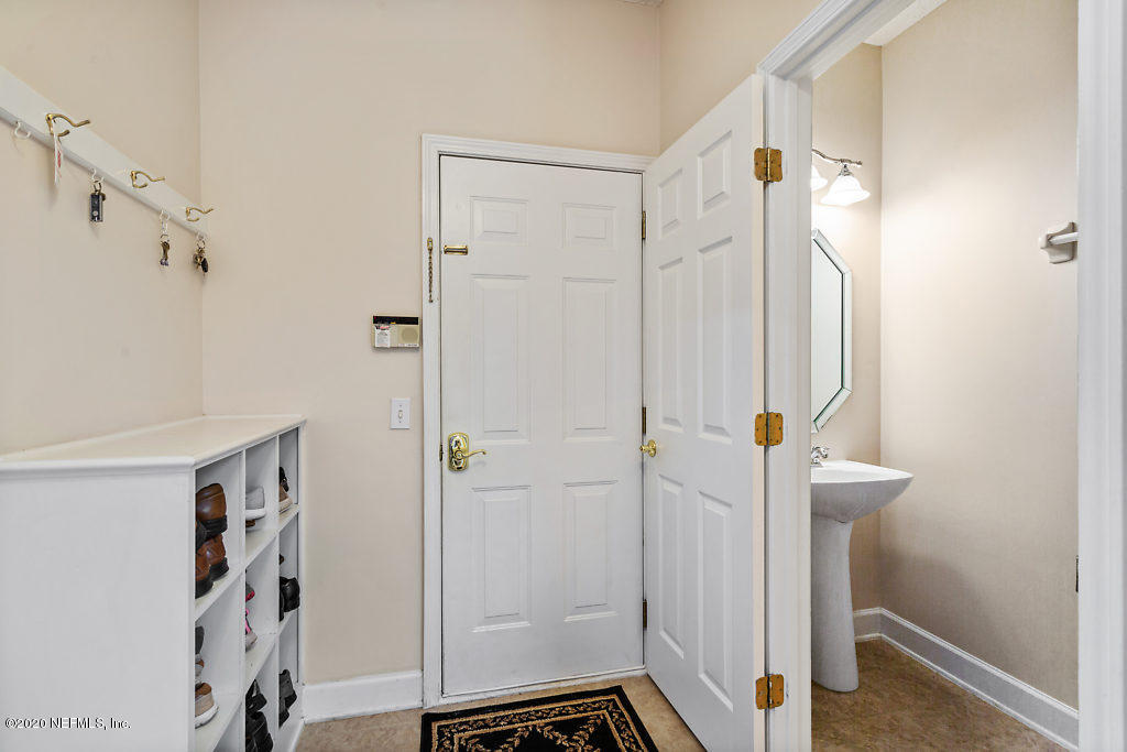 3824 Reds Gait Lane Jacksonville, FL 32223 - Photo 52 of 68 a bathroom with a shower and a sink
