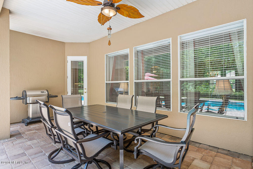 3824 Reds Gait Lane Jacksonville, FL 32223 - Photo 56 of 68 a dining room with furniture and window