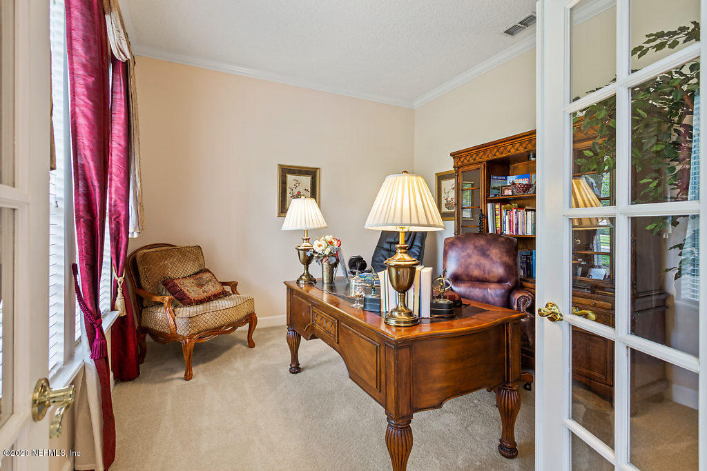 3824 Reds Gait Lane Jacksonville, FL 32223 - Photo 6 of 68 a living room with furniture
