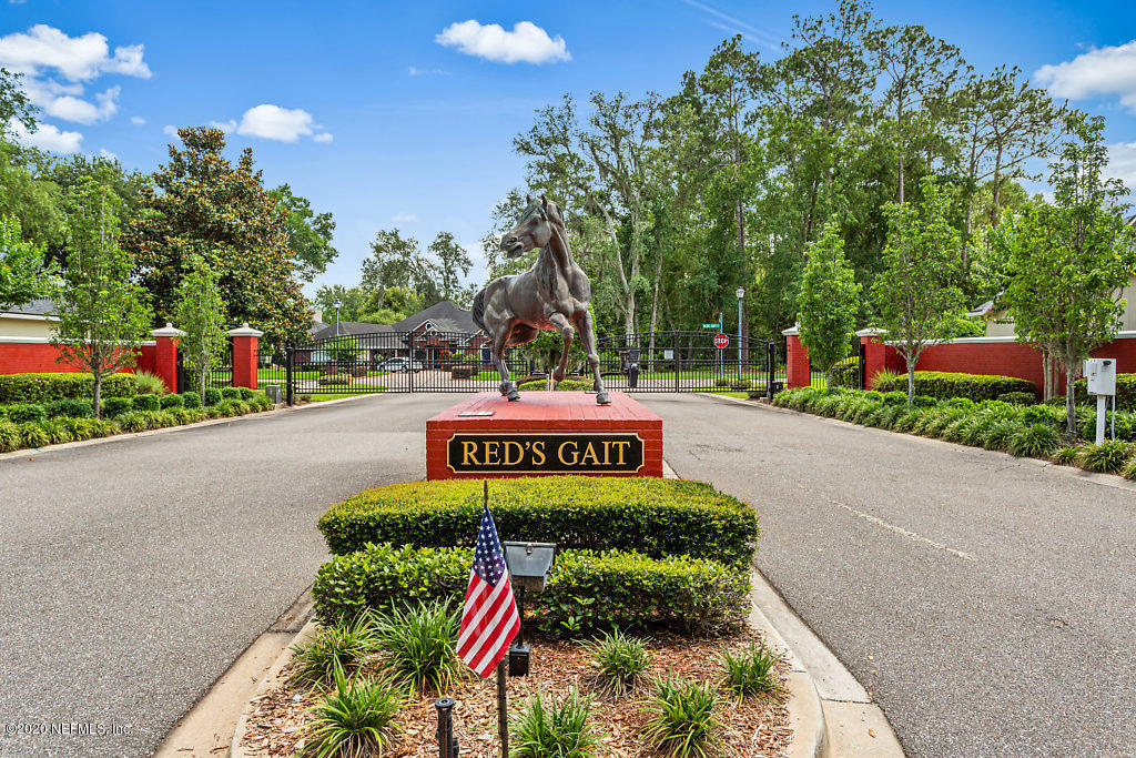 3824 Reds Gait Lane Jacksonville, FL 32223 - Photo 62 of 68 a sign that is on the side of a road
