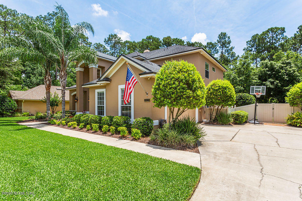 3824 Reds Gait Lane Jacksonville, FL 32223 - Photo 64 of 68 a front view of house with yard and green space