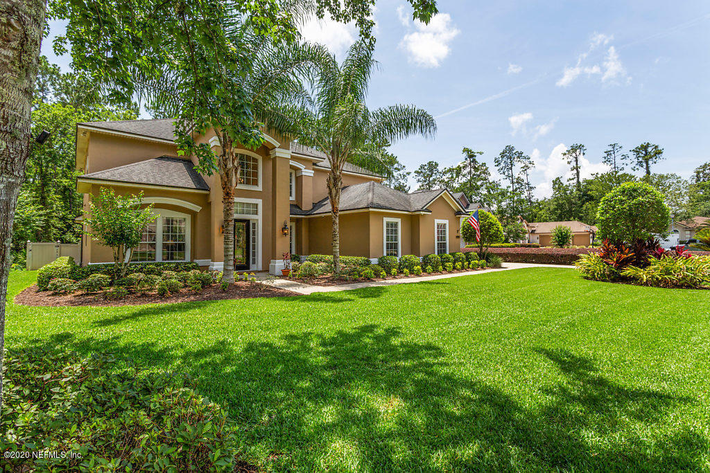 3824 Reds Gait Lane Jacksonville, FL 32223 - Photo 66 of 68 a front view of a house with swimming pool and porch with furniture