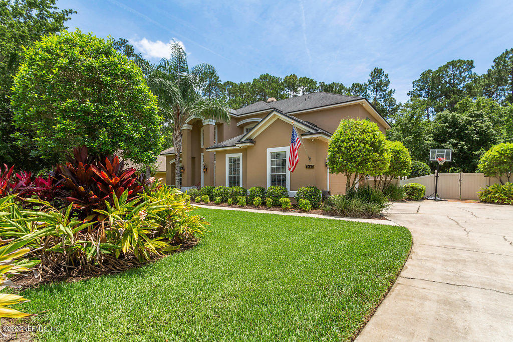 3824 Reds Gait Lane Jacksonville, FL 32223 - Photo 68 of 68 a front view of a house with a yard