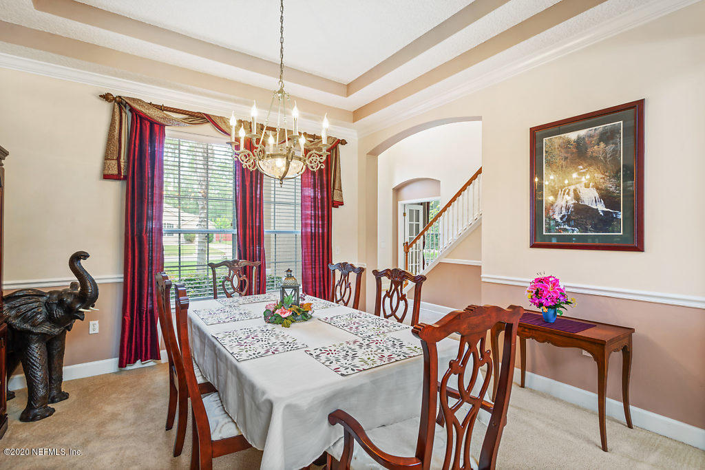 3824 Reds Gait Lane Jacksonville, FL 32223 - Photo 10 of 68 a view of a dining room with furniture window and outside view
