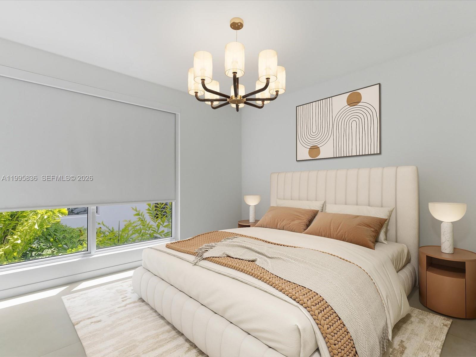 529 Southwest 11th Street, Unit 303 Miami, FL 33129 - Photo 14 of 35 a bedroom with a bed and a window