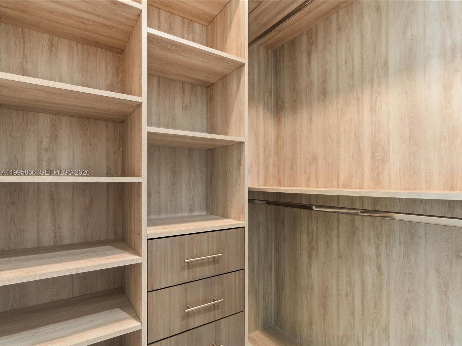 529 Southwest 11th Street, Unit 303 Miami, FL 33129 - Photo 15 of 35 a close view of walk in closet