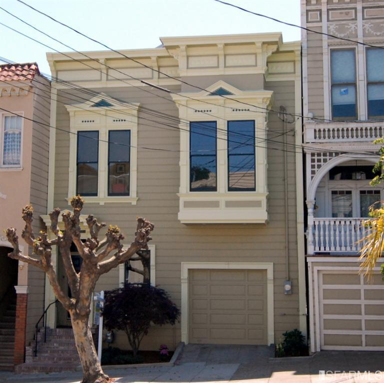 gracious living space resides behind this well maintained Victorian façade.