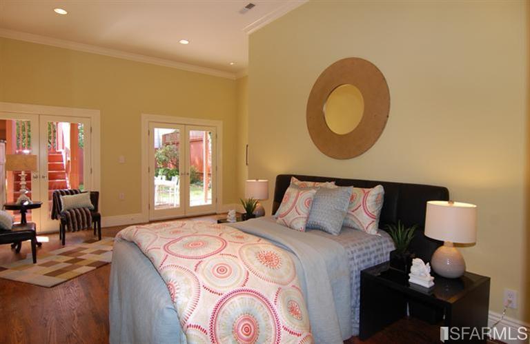 3973 Cesar Chavez San Francisco, CA 94131 - Photo 34 of 46 Last of 4 bedrooms features two sets of French doors that lead out to the patio and garden, beautiful hardwood floors, 11'ft ceilings and a large closet with custom built-ins. This is a large space that can be used in so many ways...a bedroom, guest retreat, occasional room