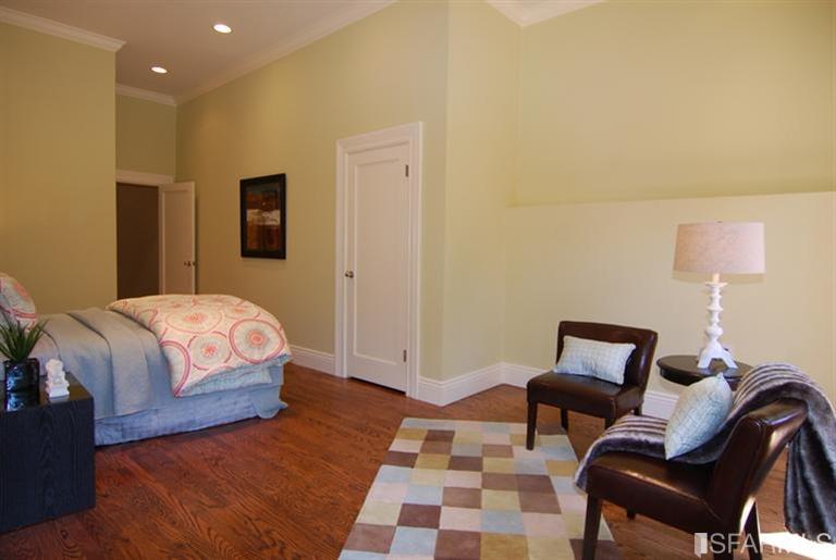 3973 Cesar Chavez San Francisco, CA 94131 - Photo 36 of 46 Last of 4 bedrooms features two sets of French doors that lead out to the patio and garden, beautiful hardwood floors, 11'ft ceilings and a large closet with custom built-ins. This is a large space that can be used in so many ways...a bedroom, guest retreat, occasional room