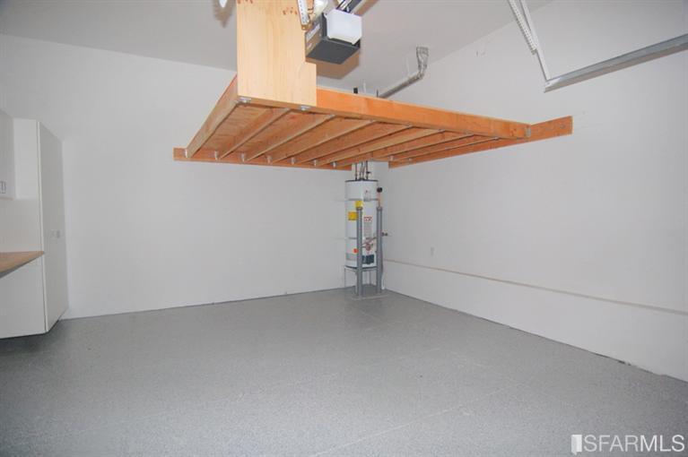 3973 Cesar Chavez San Francisco, CA 94131 - Photo 42 of 46 Spacious one car garage with plenty of storage and work space in the convenient cabinetry and loft.