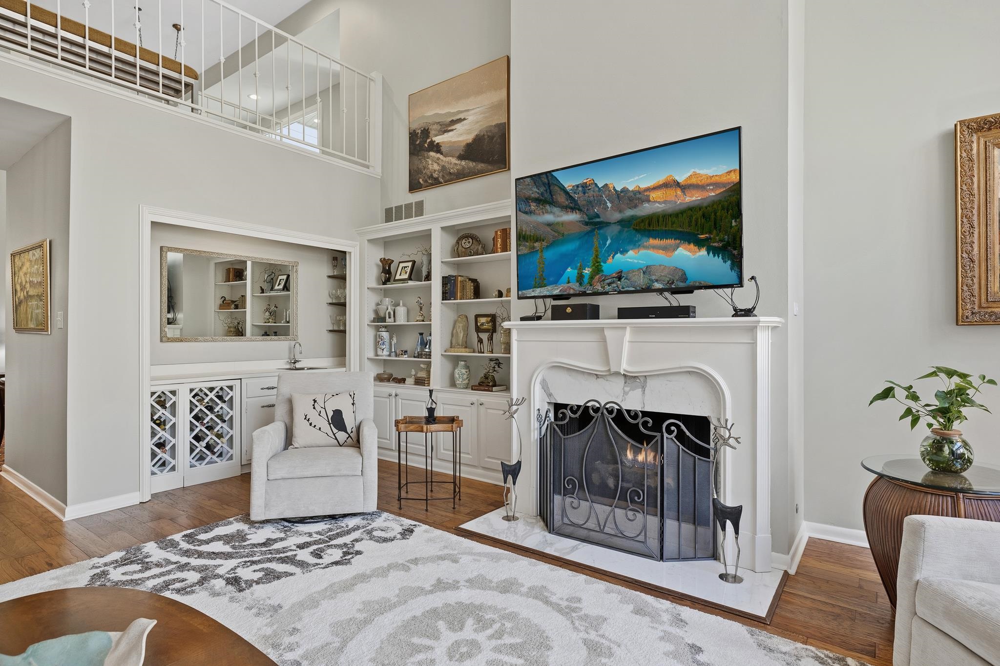 4050 Baronne Way, Unit 34 Memphis, TN 38117 - Photo 11 of 32 a living room with furniture a flat screen tv and a fireplace