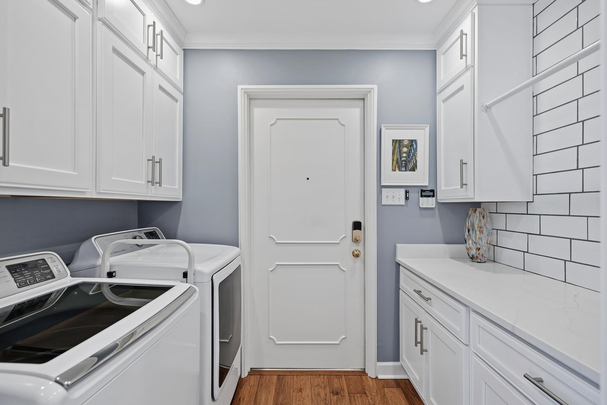 4050 Baronne Way, Unit 34 Memphis, TN 38117 - Photo 15 of 32 a view of a storage and utility room with washer and dryer