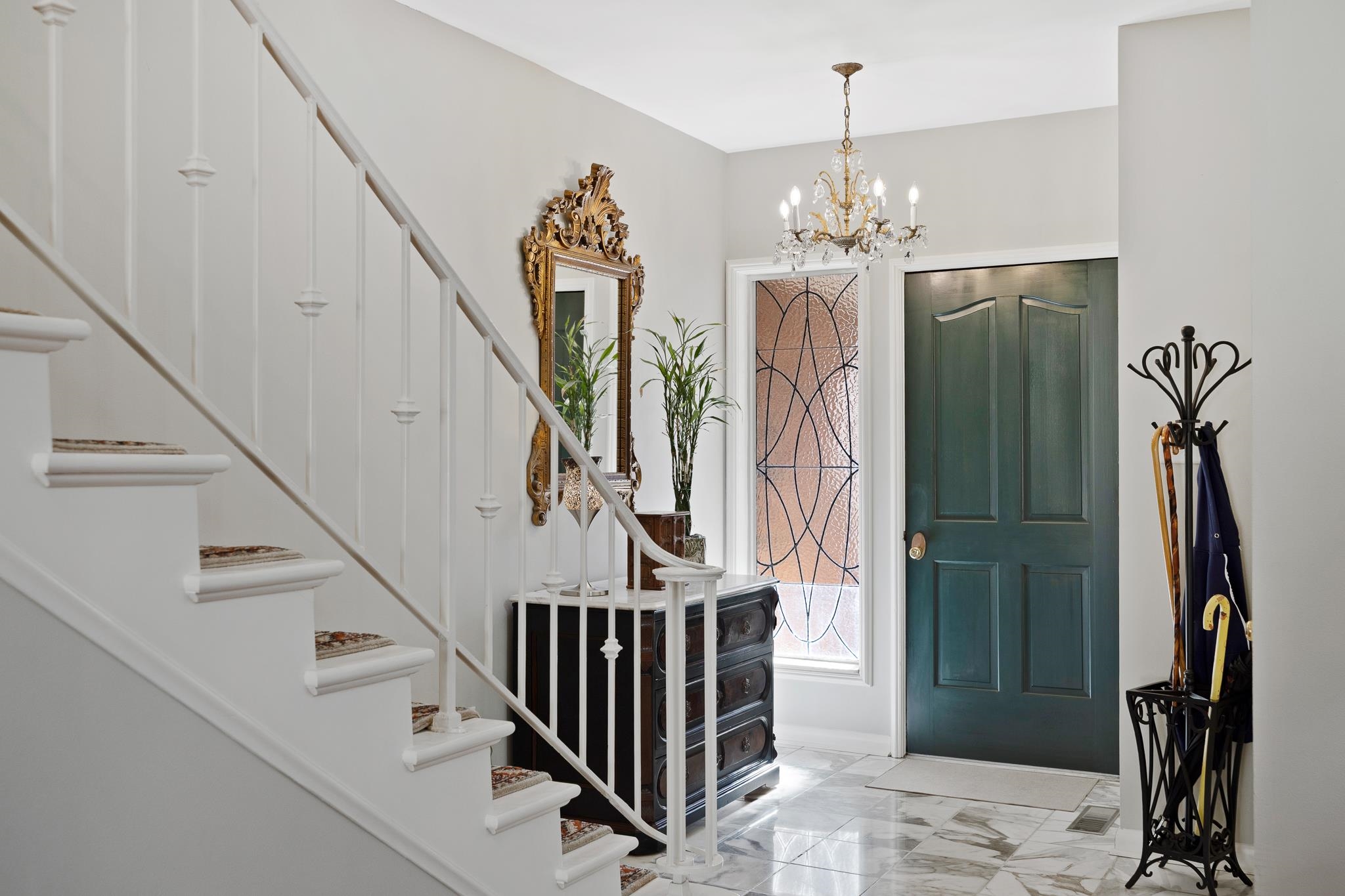4050 Baronne Way, Unit 34 Memphis, TN 38117 - Photo 4 of 32 a view of a hallway with furniture and stairs