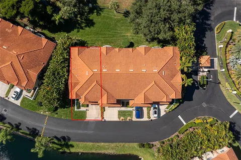a large kitchen with kitchen island a sink stainless steel appliances and cabinets