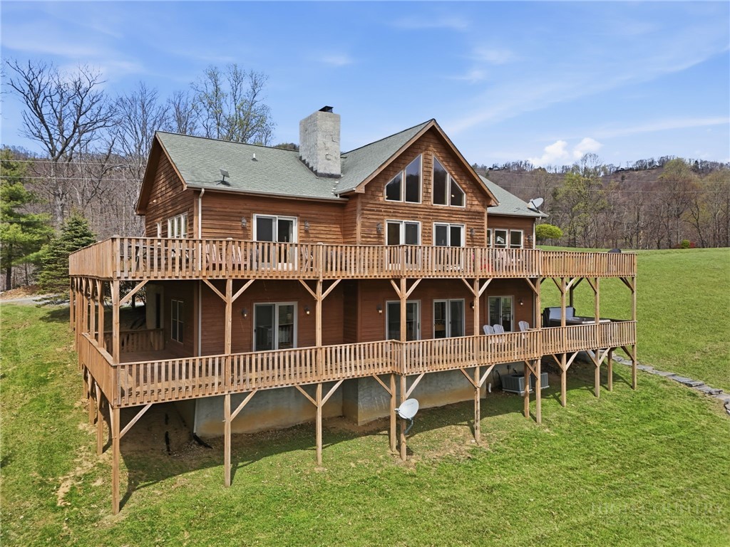 2081 Blackberry Road Boone, NC 28607 - Photo 10 of 45 a view of a house with a yard and furniture