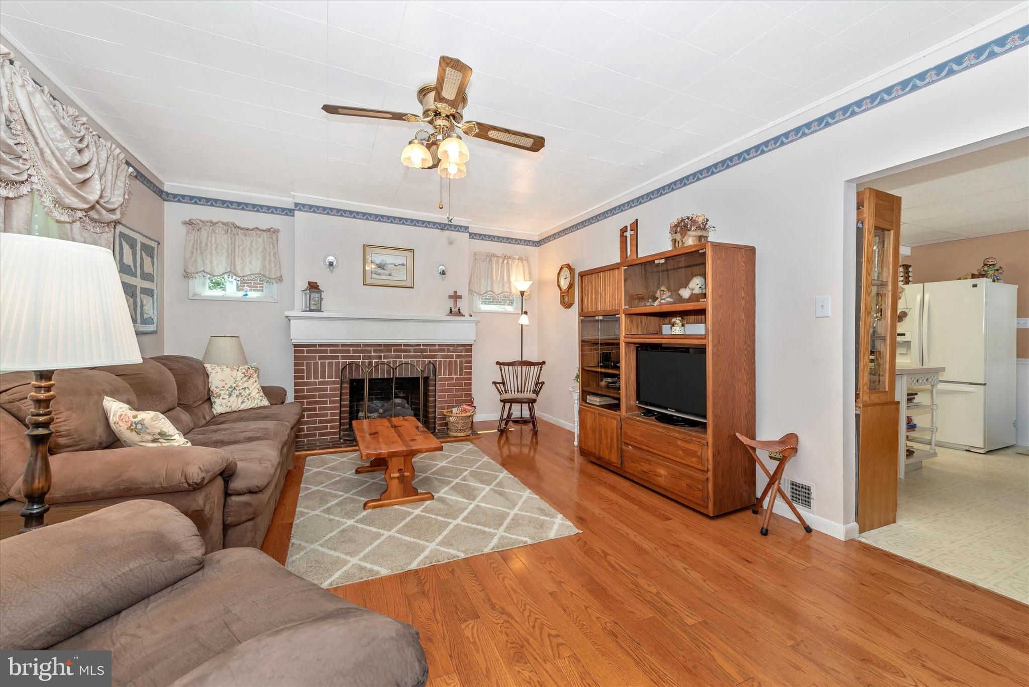 11242 Marbern Road Hagerstown, MD 21740 - Photo 8 of 54 Living Room w/ Gas Fireplace