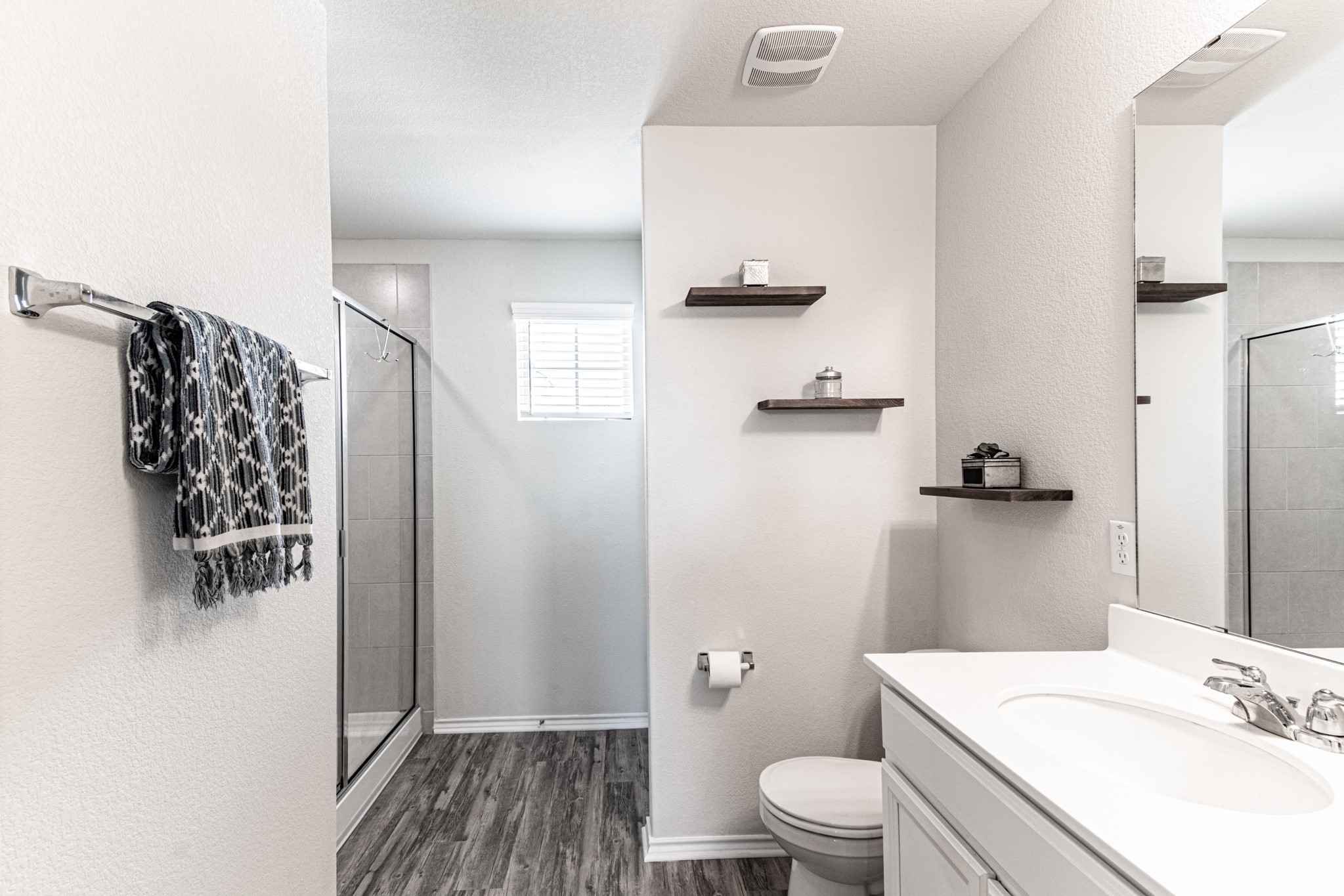 192 Spotted Rail Ridge Leander, TX 78641 - Photo 17 of 34 a bathroom with a sink toilet and shower