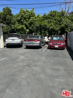 a view of a cars parked in a parking lot
