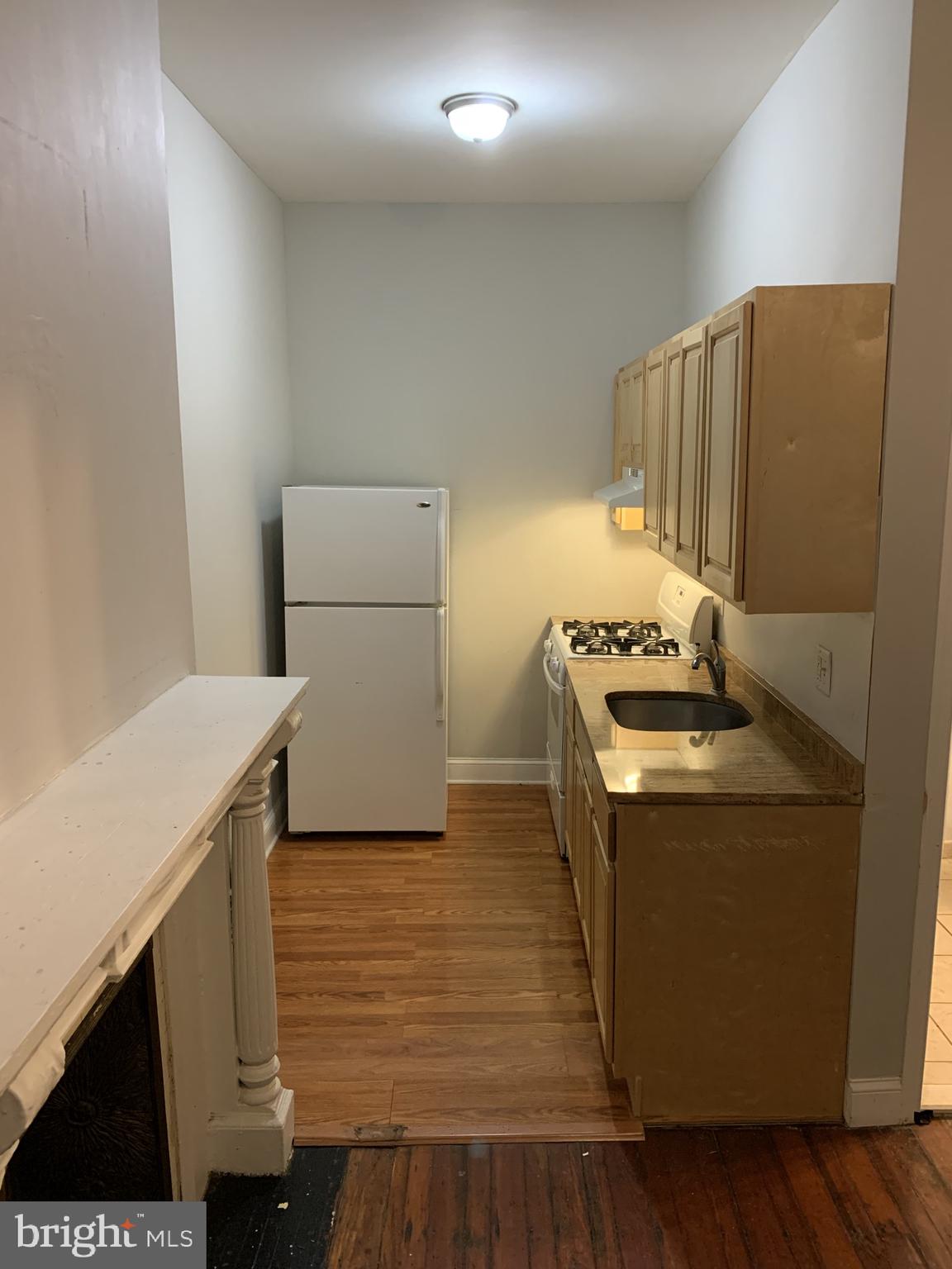 4437 Chestnut Street, Unit 1F Philadelphia, PA 19104 - Photo 8 of 15 a utility room with washer and dryer