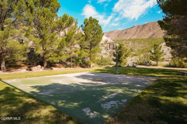 a view of a yard from a balcony
