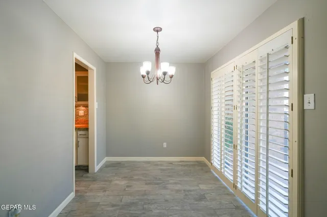 a view of a room with a large window