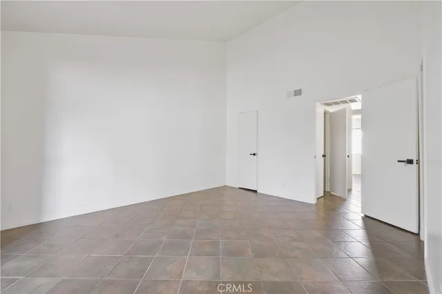 a bathroom with a sink vanity tub and a mirror
