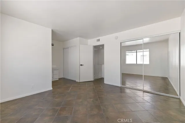 a bathroom with a shower and toilet