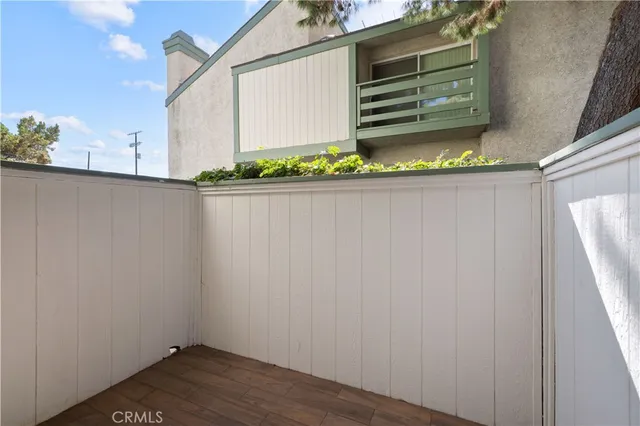a view of a hallway with a living room