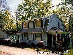7235 Maple Lake Road Moscow, PA 18444 - Photo 1 of 1 a front view of a house with a yard