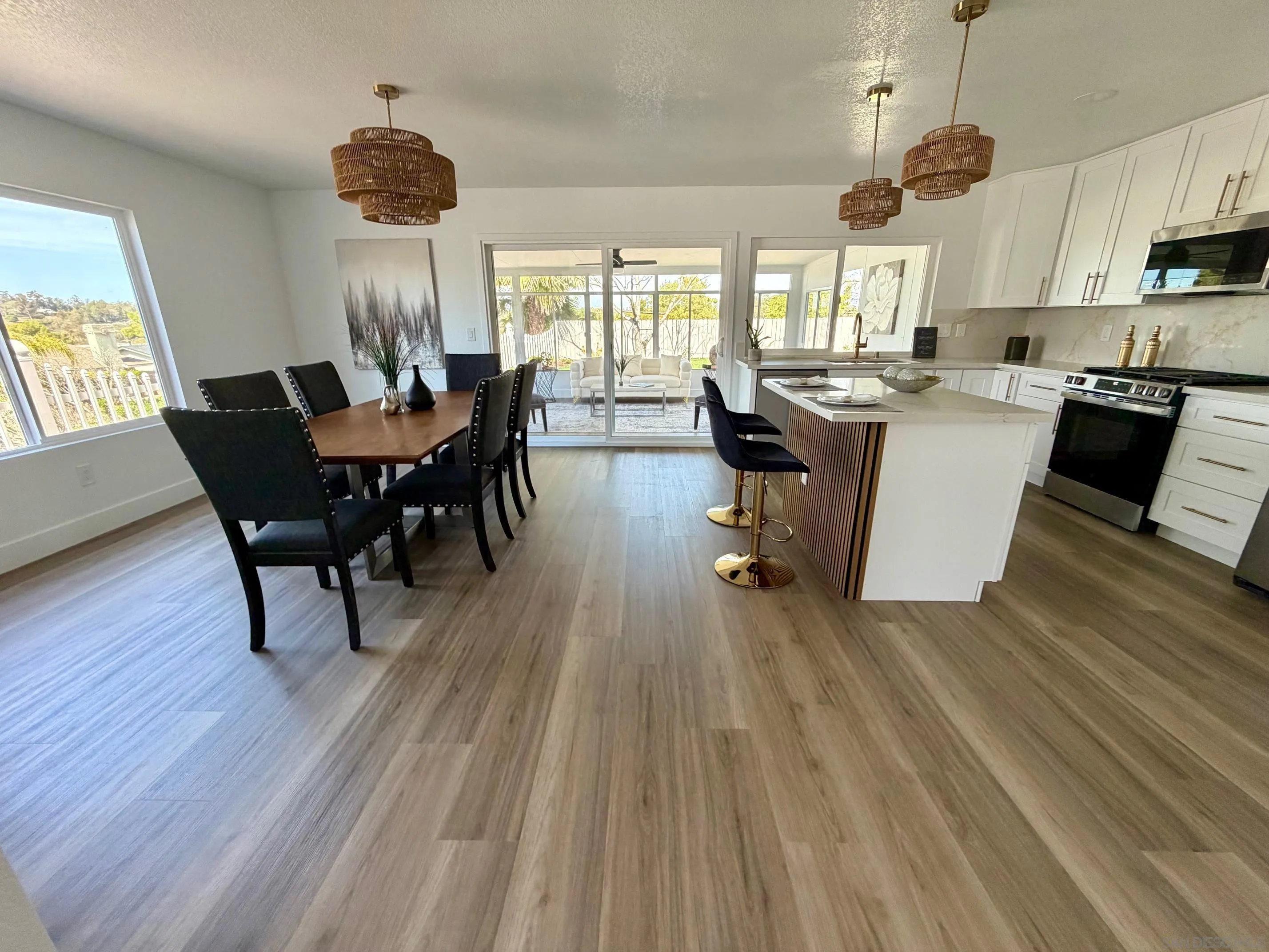 4128 Terry Street Oceanside, CA 92056 - Photo 11 of 21 a living room with furniture and a wooden floor