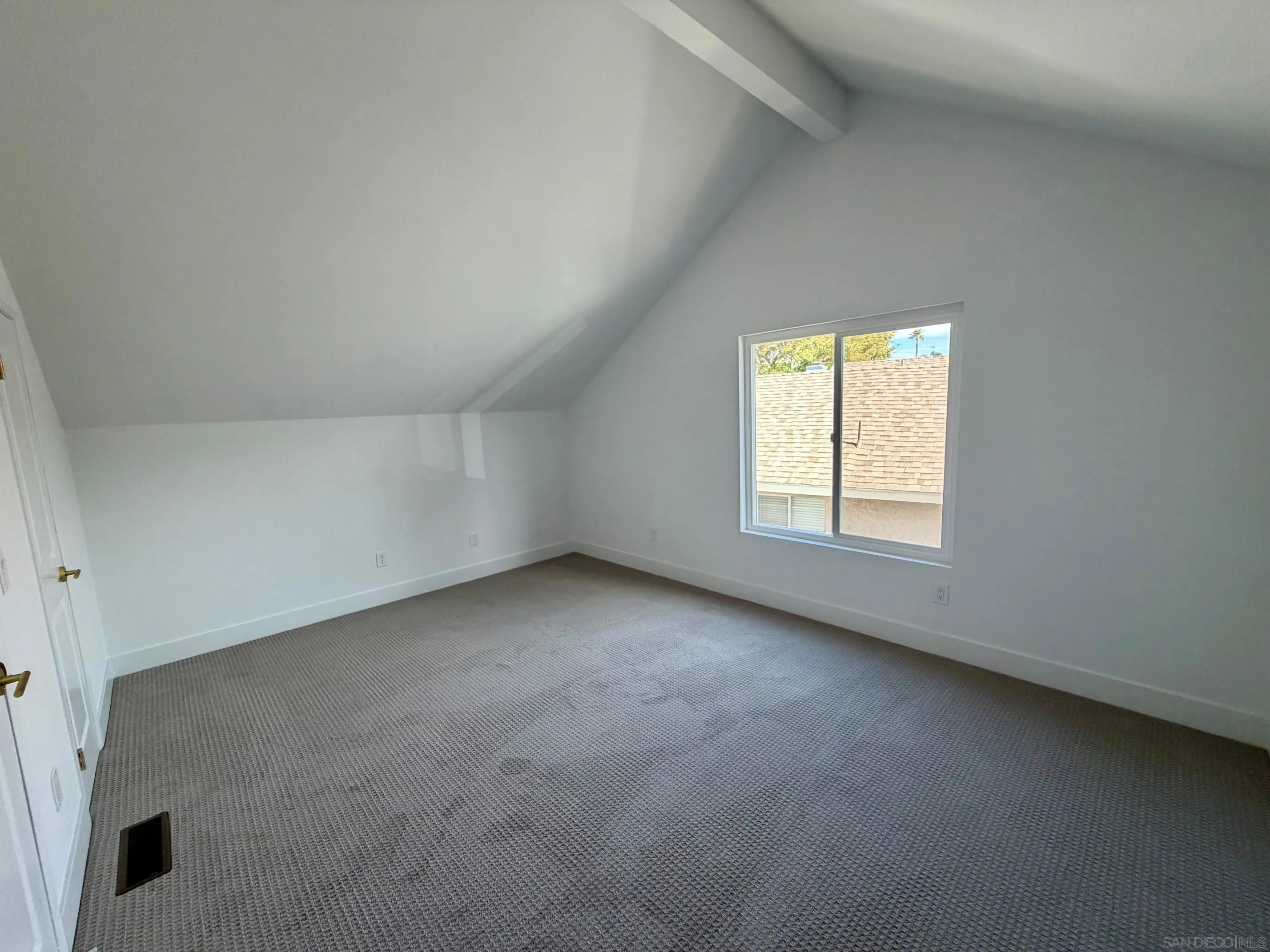 4128 Terry Street Oceanside, CA 92056 - Photo 14 of 21 an empty room with a window