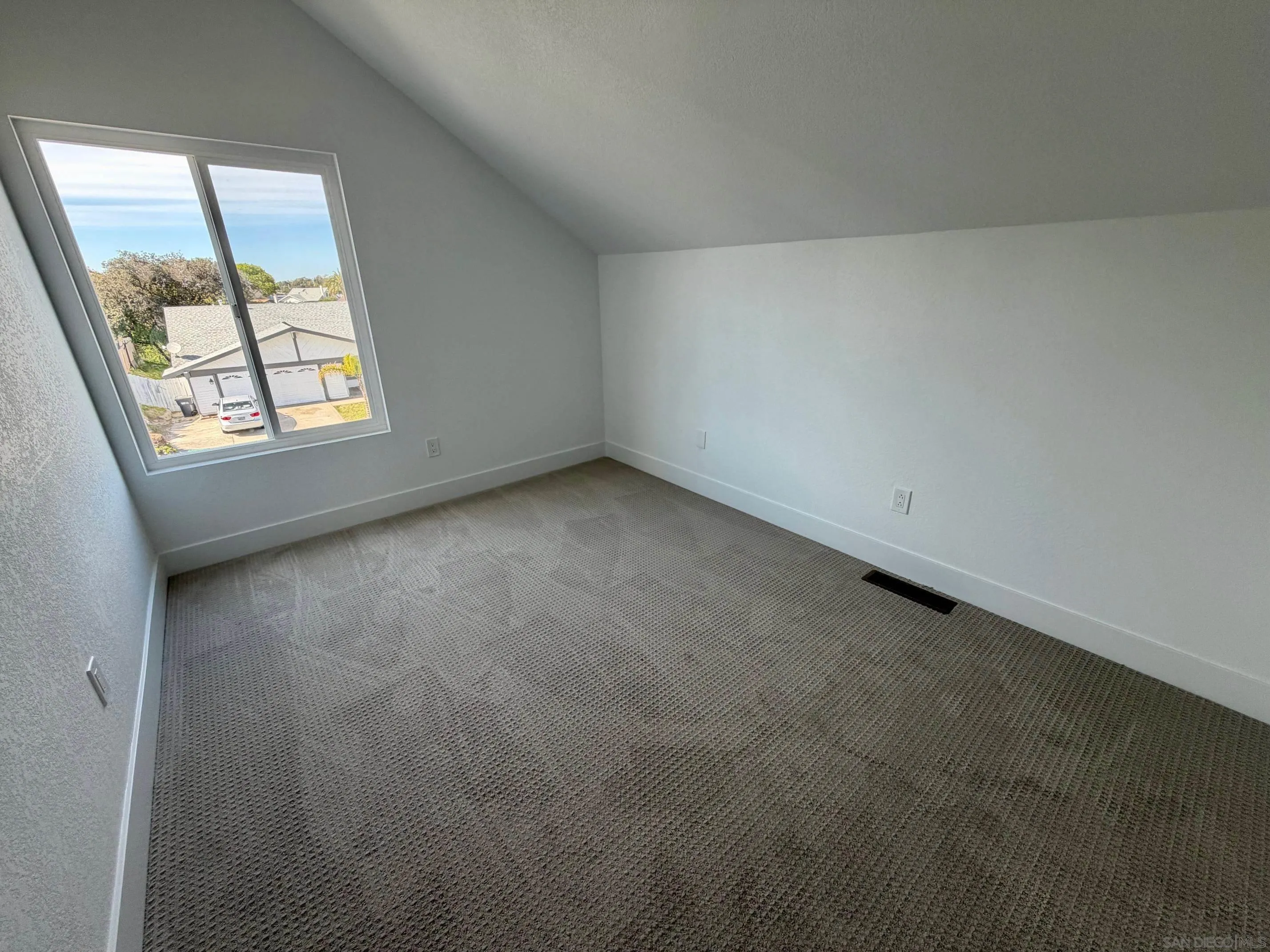 4128 Terry Street Oceanside, CA 92056 - Photo 17 of 21 an empty room with a window