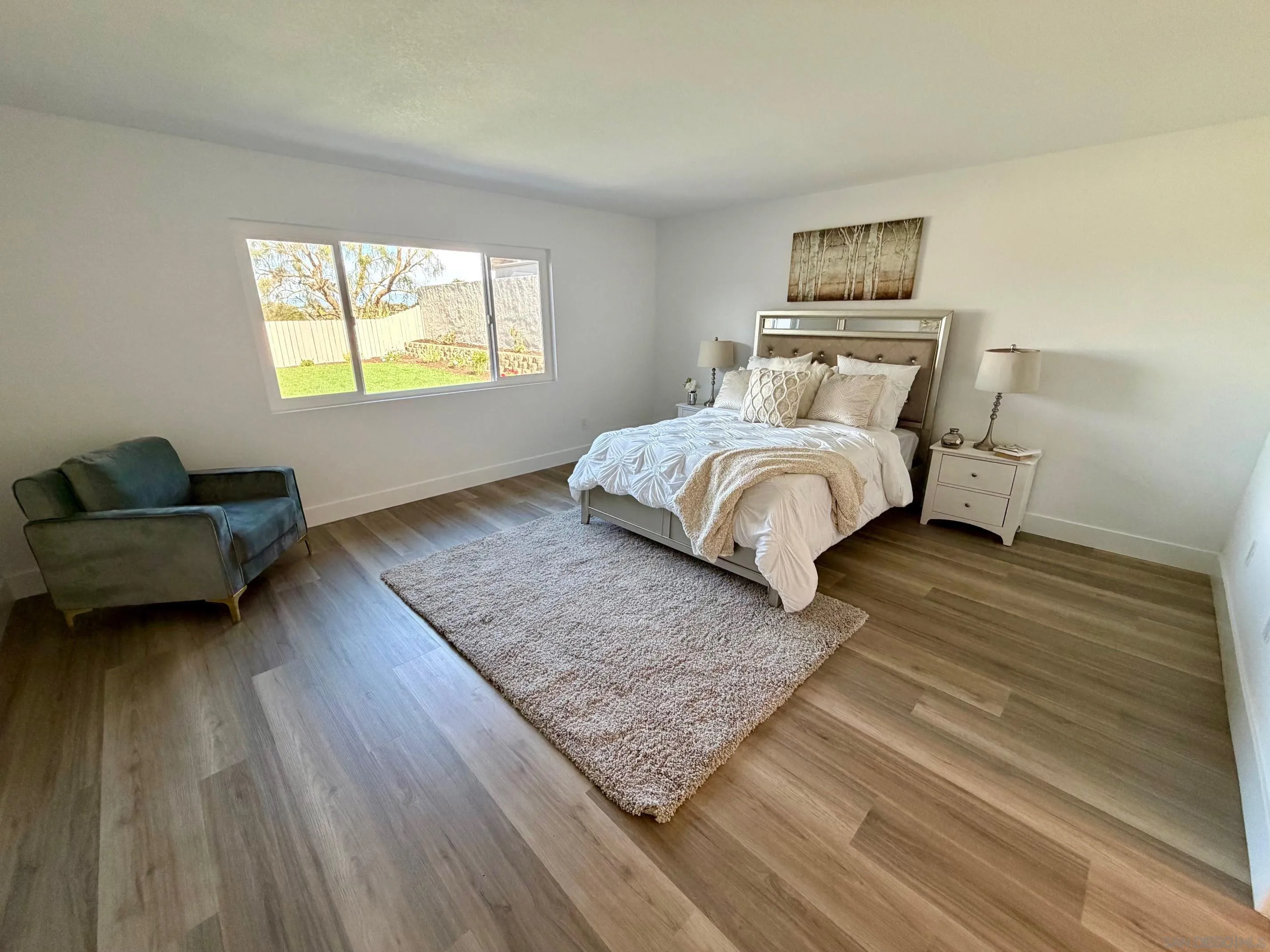 4128 Terry Street Oceanside, CA 92056 - Photo 6 of 21 a bedroom with a bed and window