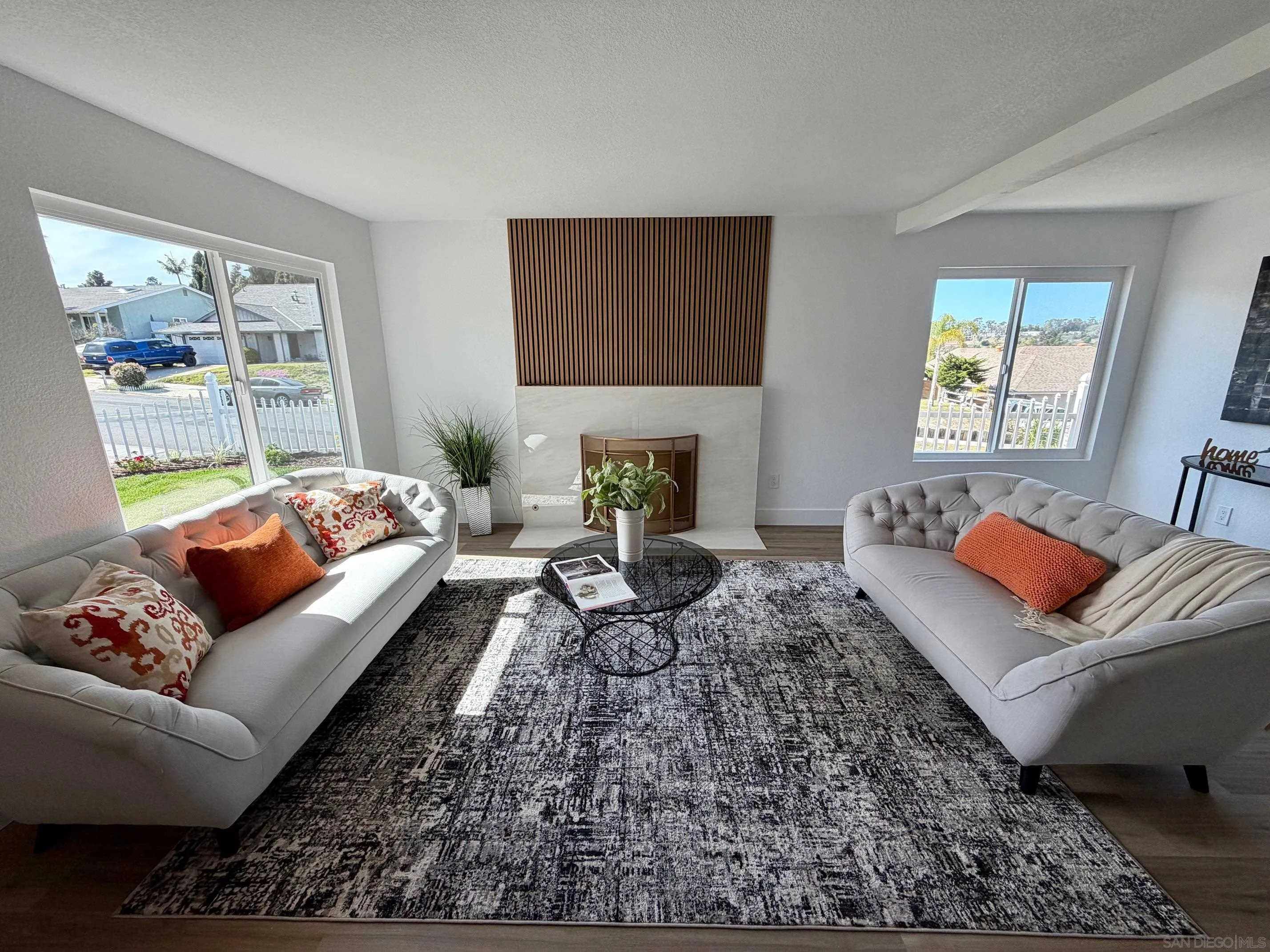 4128 Terry Street Oceanside, CA 92056 - Photo 7 of 21 a living room with furniture and a couch