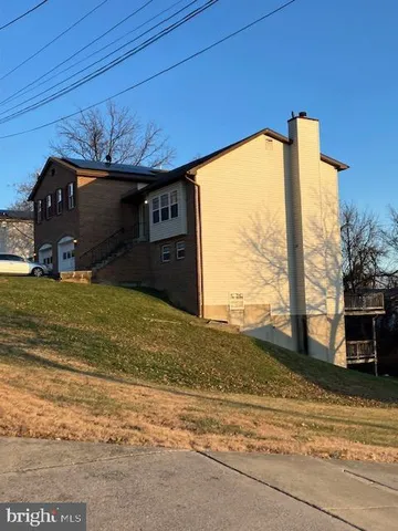 a view of a house with a big yard