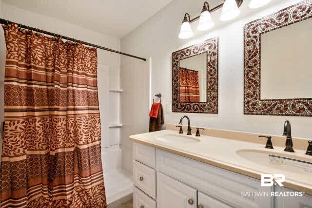 1903 Juniper Street North Foley, AL 36535 - Photo 7 of 16 Walk in shower and double vanity