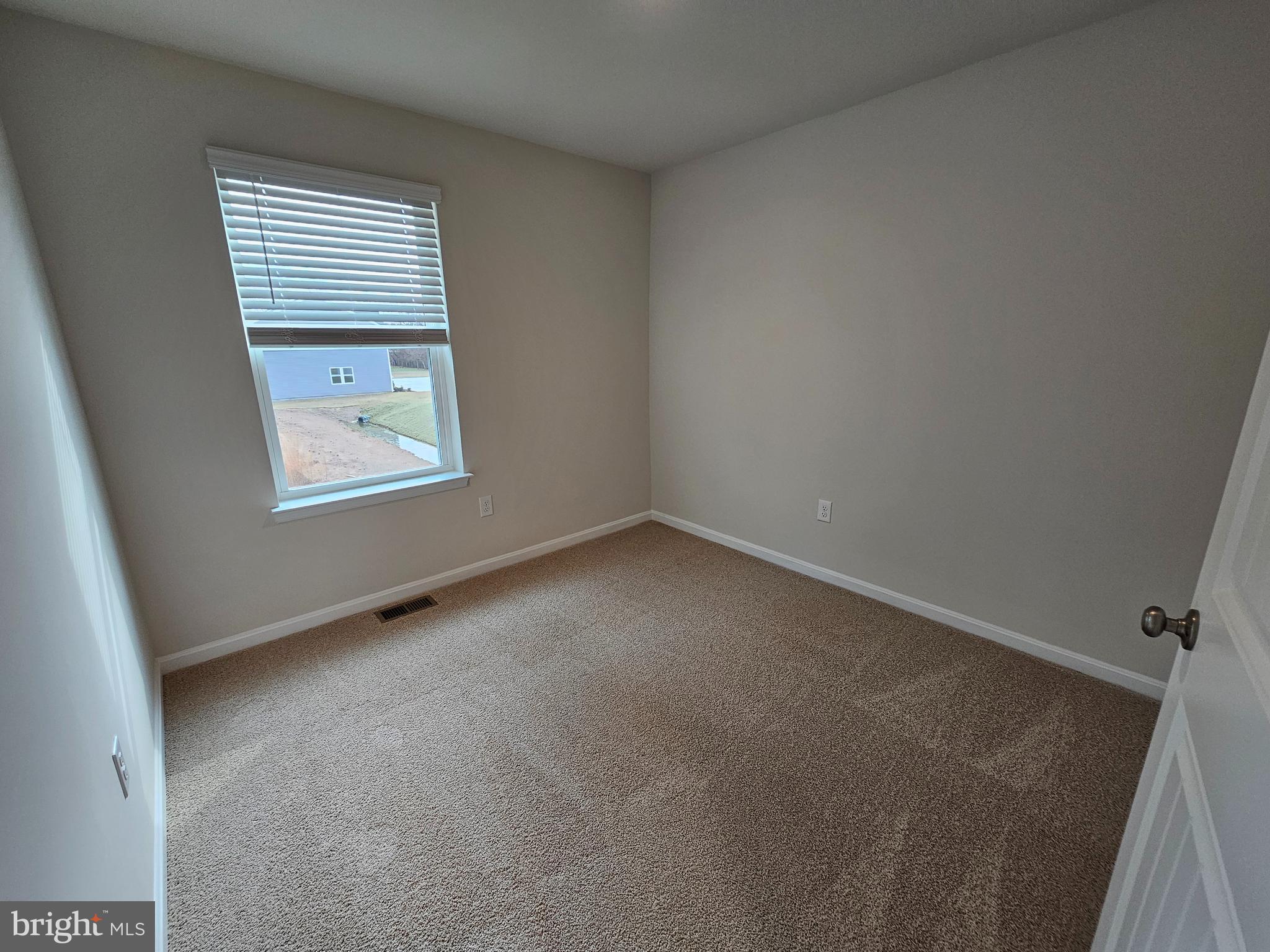 1509 Avon Way Salisbury, MD 21801 - Photo 11 of 19 an empty room with a window