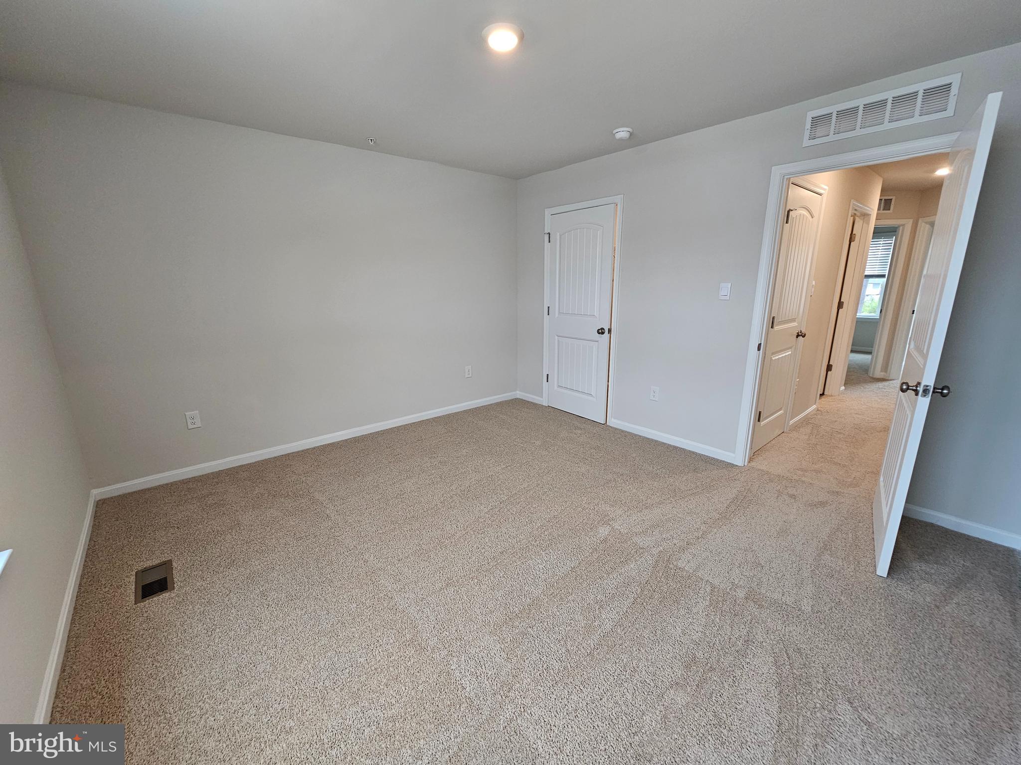 1509 Avon Way Salisbury, MD 21801 - Photo 15 of 19 an empty room with a mirror