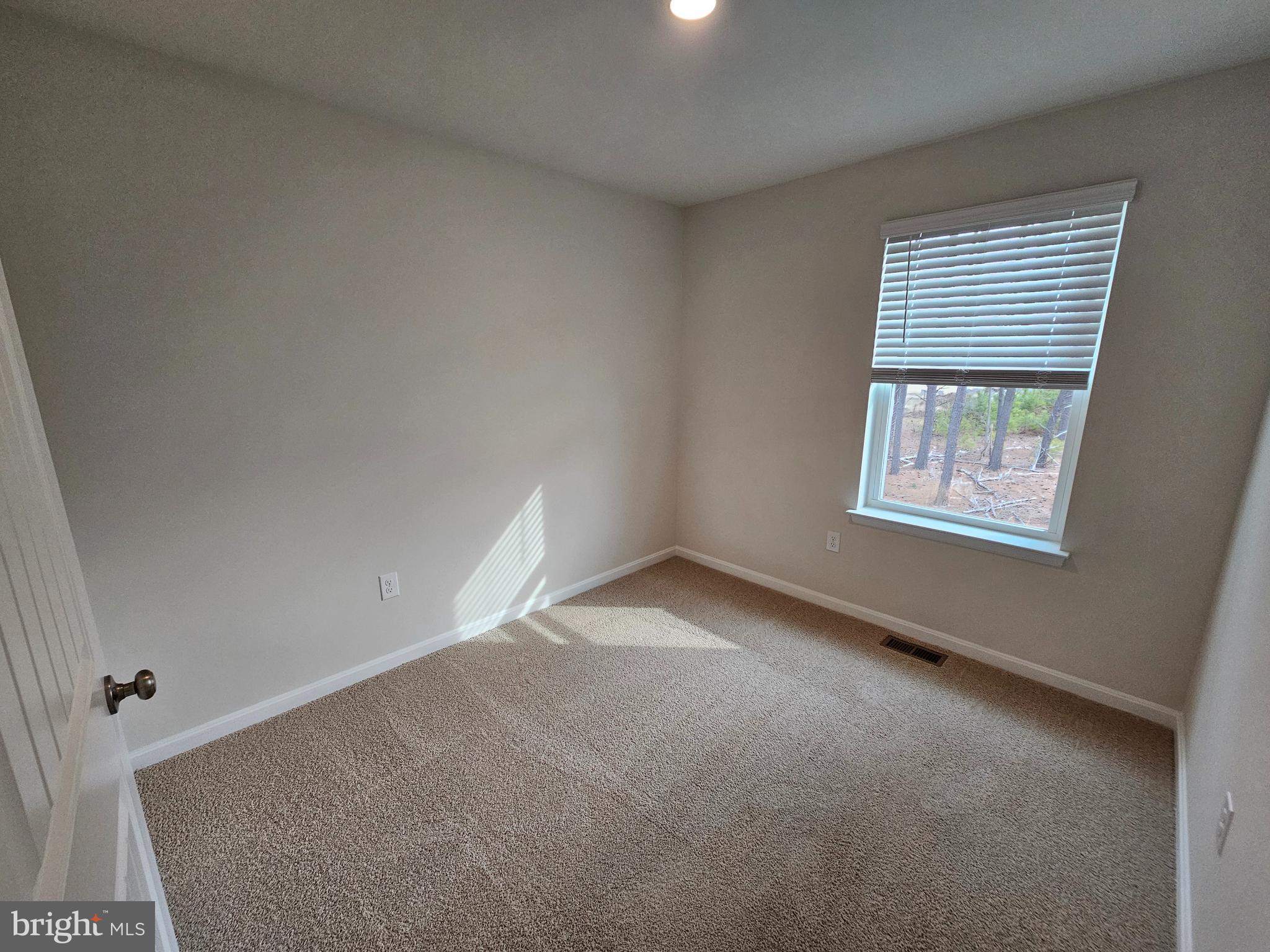 1509 Avon Way Salisbury, MD 21801 - Photo 8 of 19 an empty room with windows