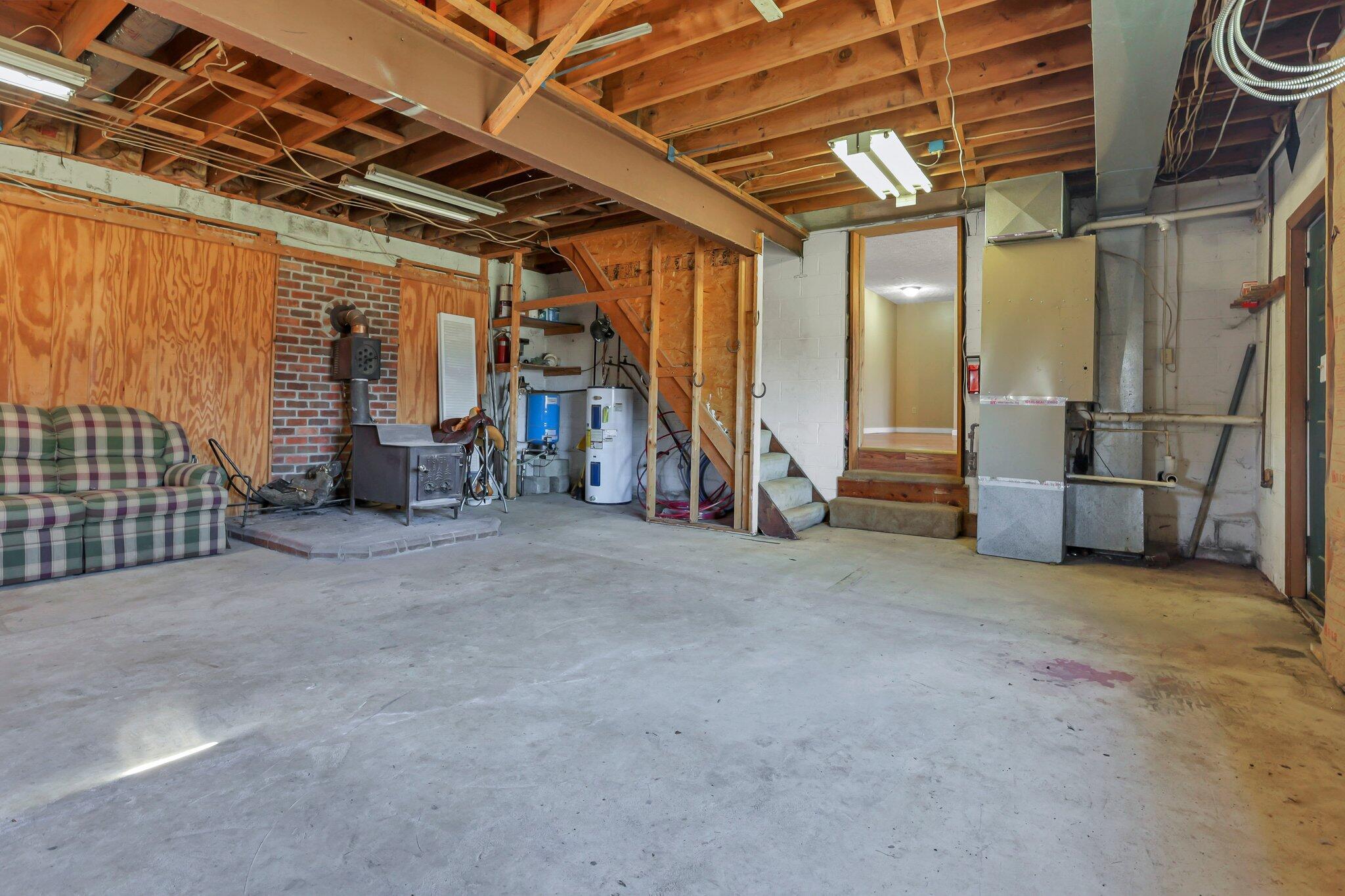 5225 Deeds Road Southwest Pataskala, OH 43062 - Photo 19 of 43 Family room w/wood burning stove