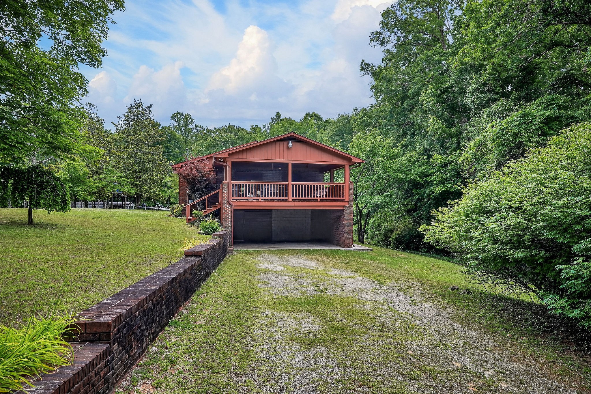 5642 Pates Ford Road Smithville, TN 37166 - Photo 30 of 32 a view of a large garden with large trees