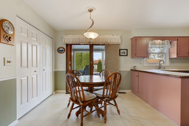 3490 Ronald Road Crete, IL 60417 - Photo 13 of 25 a dining room filled chandelier and wooden floor